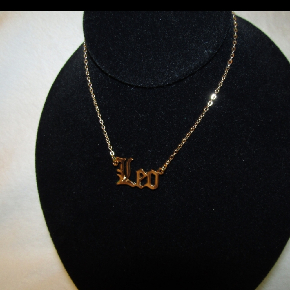 B2G1F! "Leo" Zodiac birth gold tone necklace